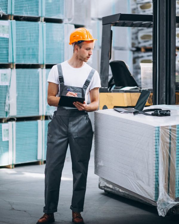 young-man-working-at-warehouse-with-boxes(1)